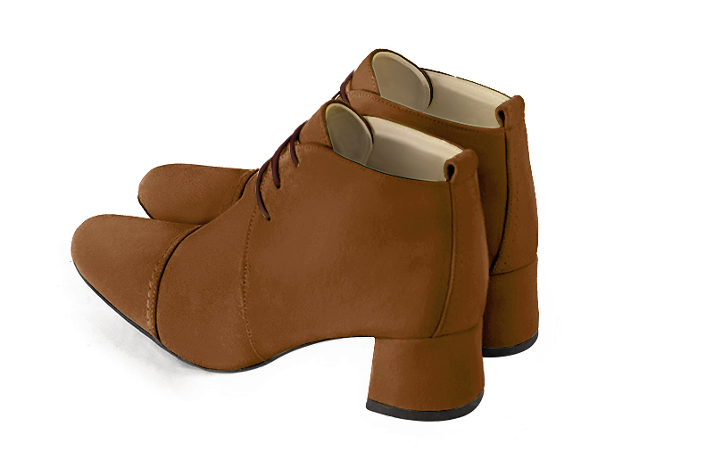 Caramel brown women's ankle boots with laces at the front. Round toe. Low flare heels. Rear view - Florence KOOIJMAN